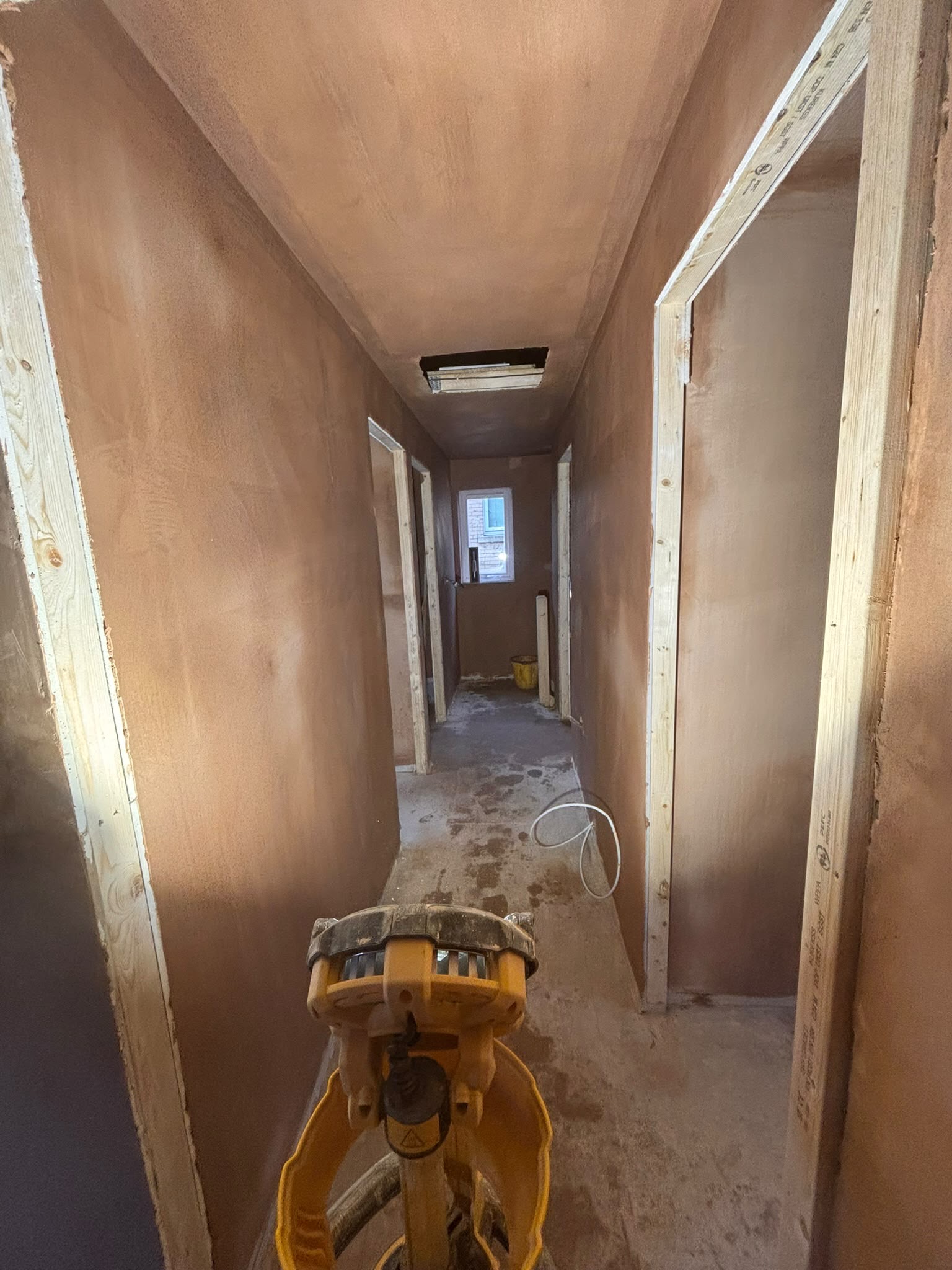 Room walls and ceiling plastering in progress