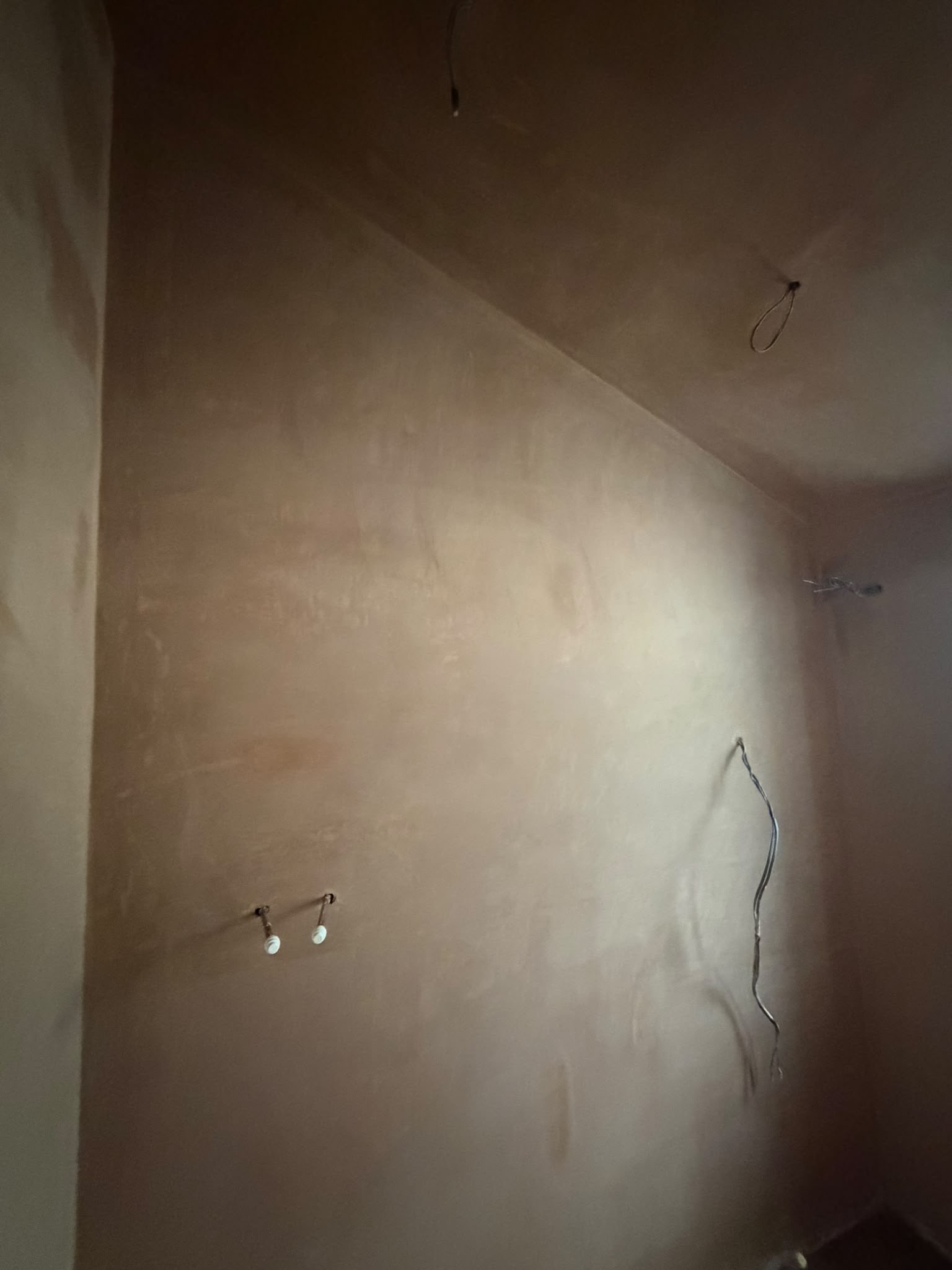 Broad newly plastered wall in a renovation project